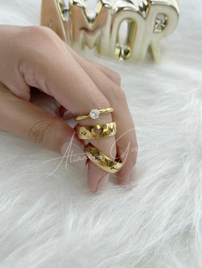 mod-16-1-1.jpg Par de Alianças Banhadas Abaulada Coração com Batimento - Imagem 1