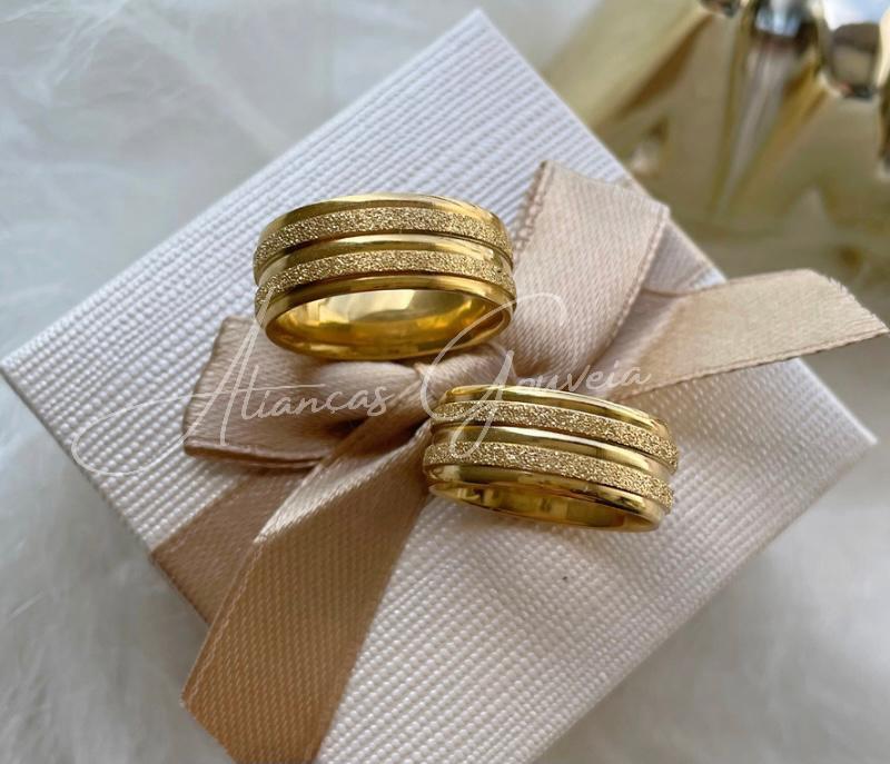 mod-jat-capa.jpg Par de Alianças Banhadas Reta 8MM Jateada - Imagem 1